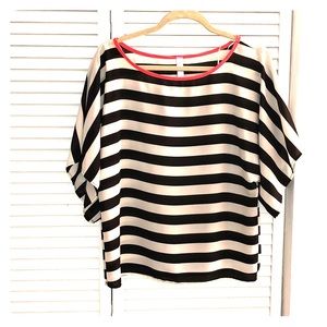 Black and white striped blouse with red trim